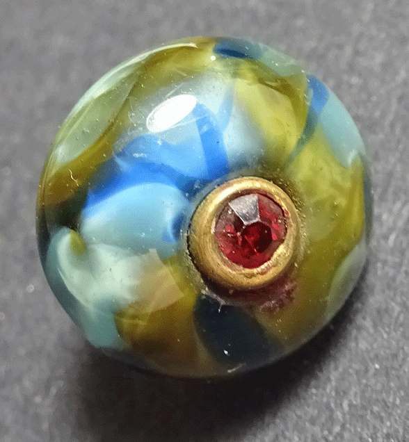 Marbled glass waistcoat buttons with red paste stone