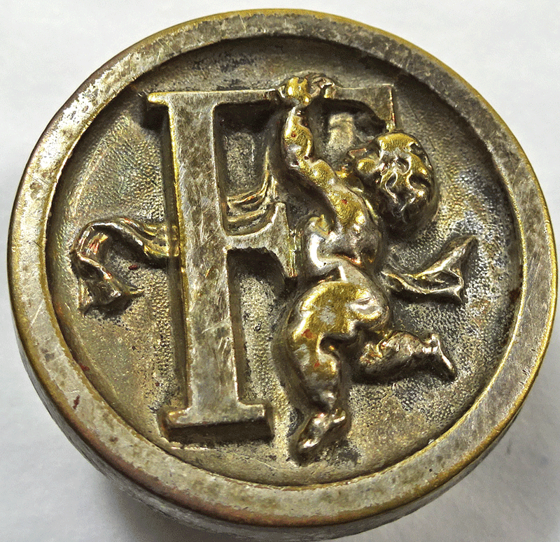 Antique cherub & letter F button