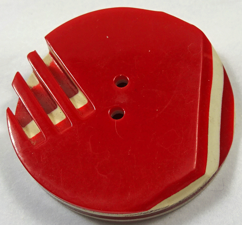 Red and cream laminated Art Deco casein
