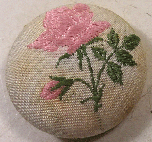 Machine embroidered pink rose