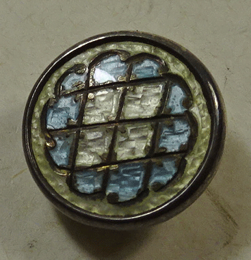 Small pale blue and white enamel dress button