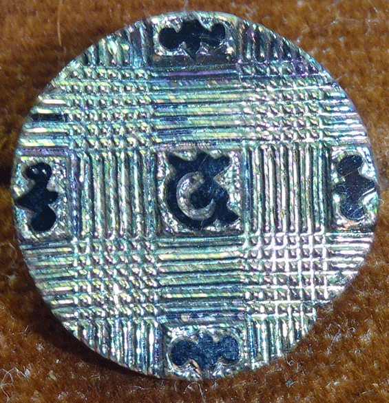 Flat black glass, incised lines, lustre