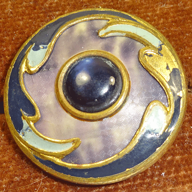 Painted blue metal, with blue glass centre