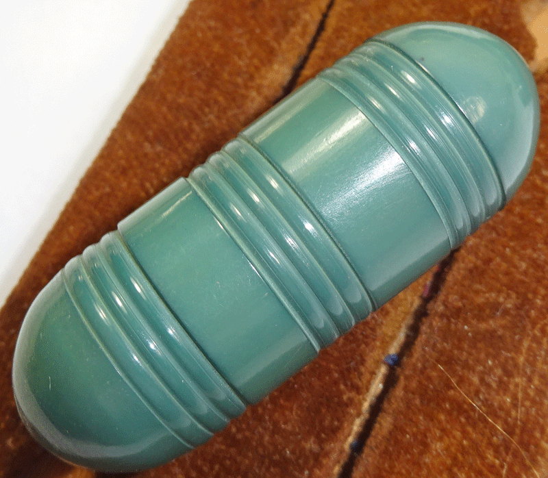 Large green torpedo shape