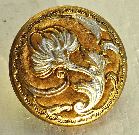 Small silver painted flower over fabric