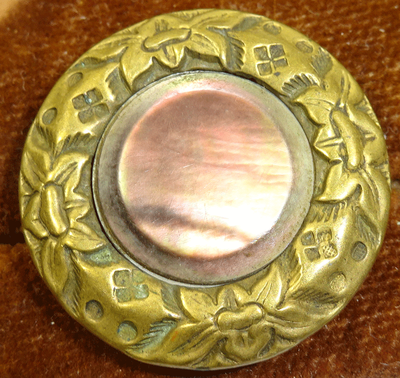 Mother of pearl in metal wreath border