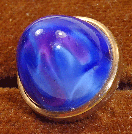 Small blue glass dome in metal