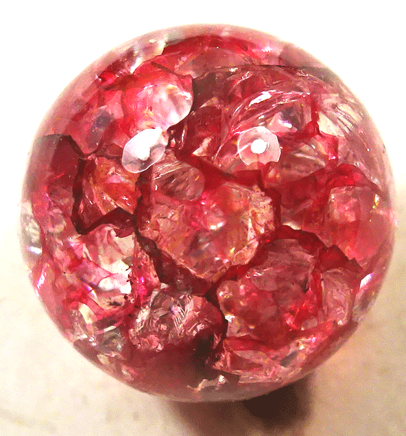 Pink streaks in clear glass ball