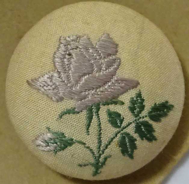 Embroidered pale purple rose