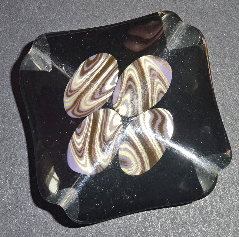 Large black square, with purple & cream swirls