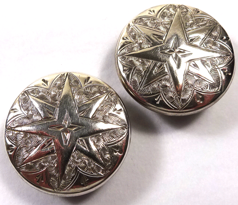 Pair of silver topped star studs