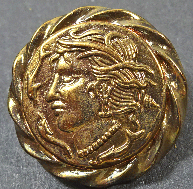 Vintage metallic plastic female head button