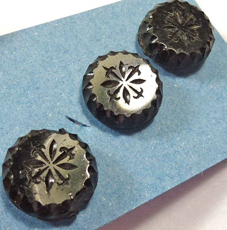 Set of 3 black glass buttons, incised flat top
