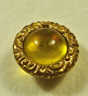 Tiny glove buttons with yellow glass