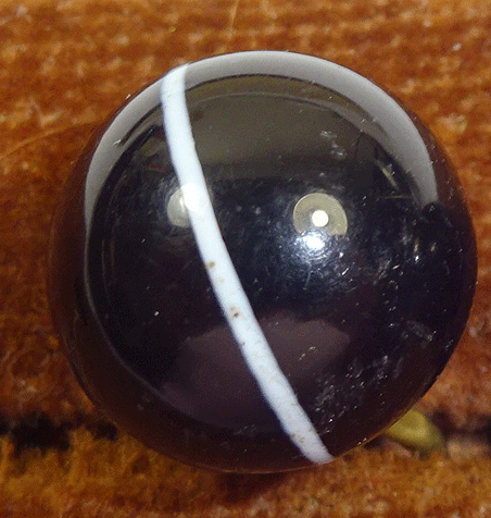 Black glass waistcoat ball with white stripe