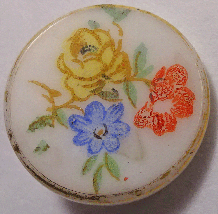 Stencilled flowers on white glass