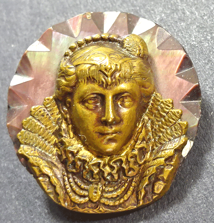 Female head on mother of pearl base