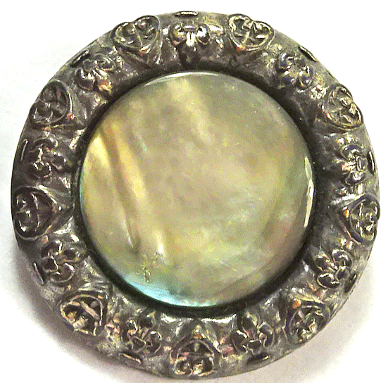 Pearl in pressed metal border