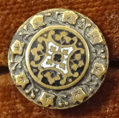 Small pressed brass with enamel centre