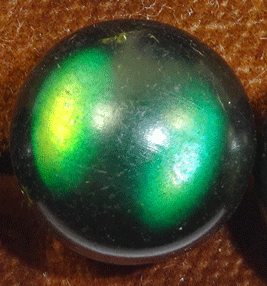 Small green celluloid with spots