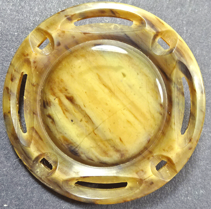 Pierced and molded casein