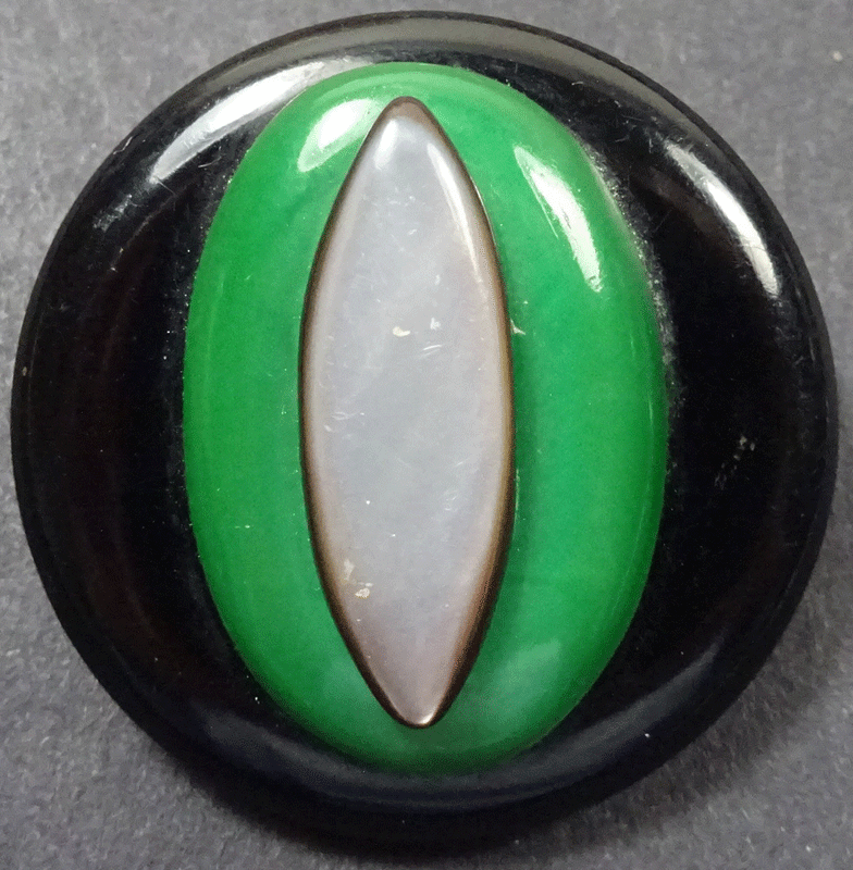 Large pearl on green on black