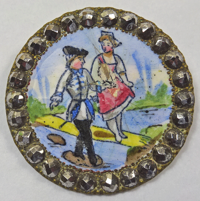Figural enamel with cut steel rim (A/F)