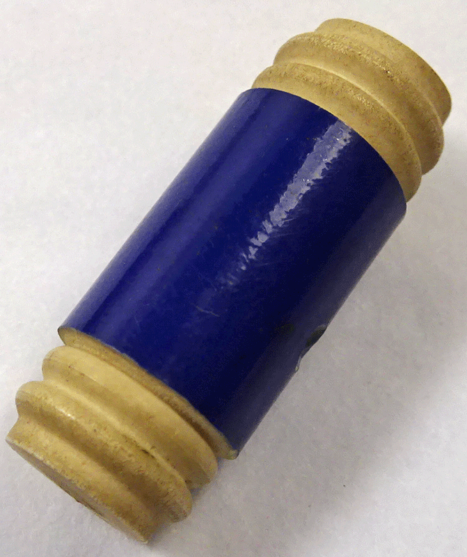 Blue cylinder button