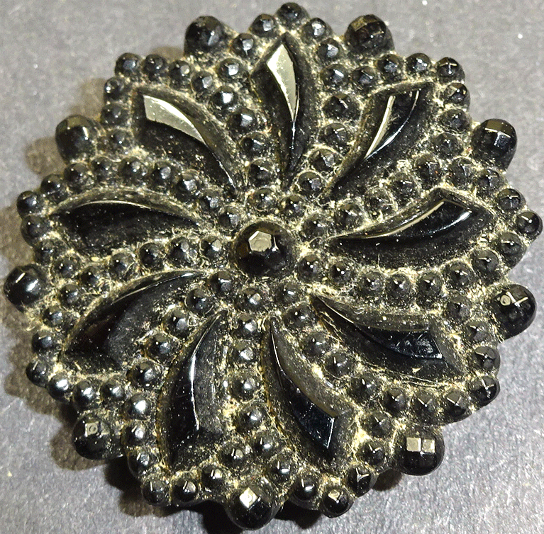 Black glass, scalloped edge spiral