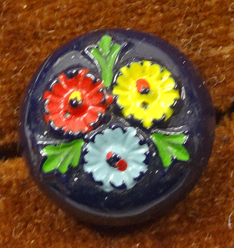 Small blue glass painted with flowers