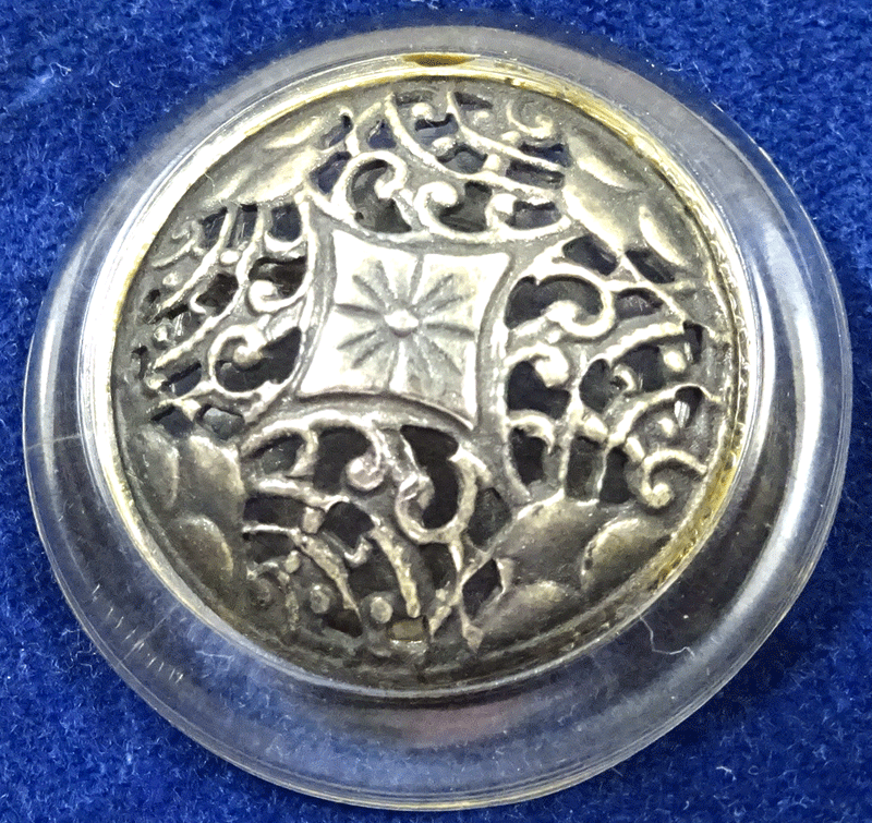 nd706-pierced-metal-on-lucite.gif