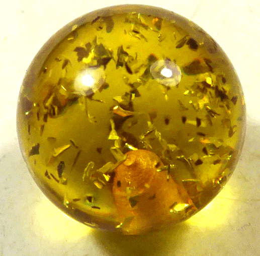 Yellow glass ball button with sparkly bits