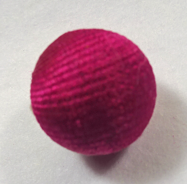Small pink fabric ball, threadback