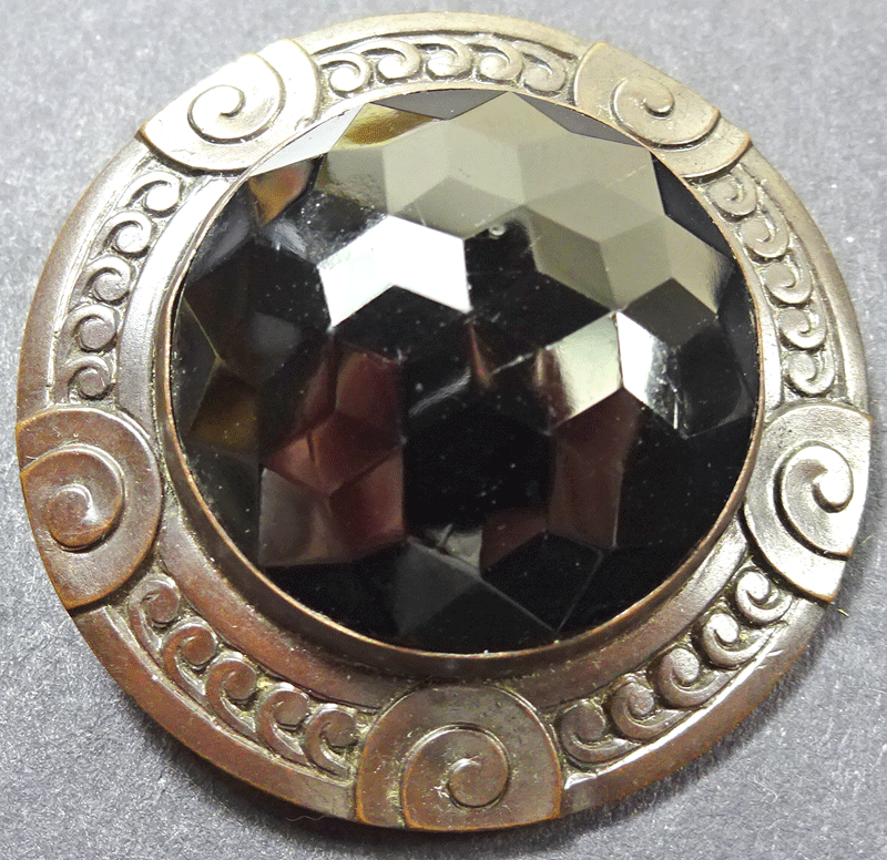 Large black glass in metal frame