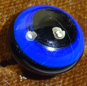 Black glass waistcoat button with blue line