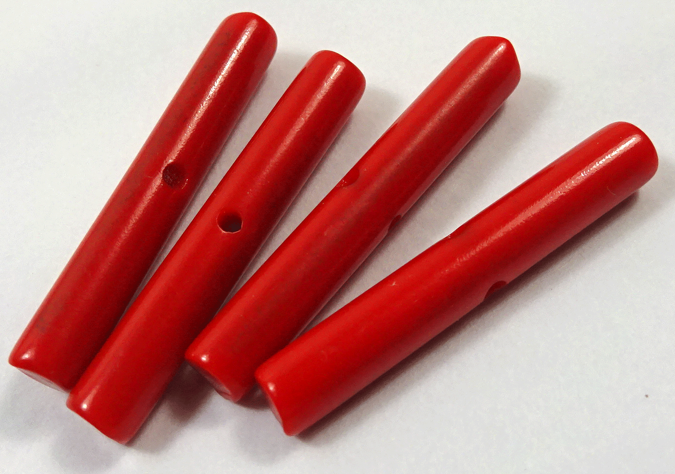 nsy467-set-of-4-narrow-red-cylinders.gif