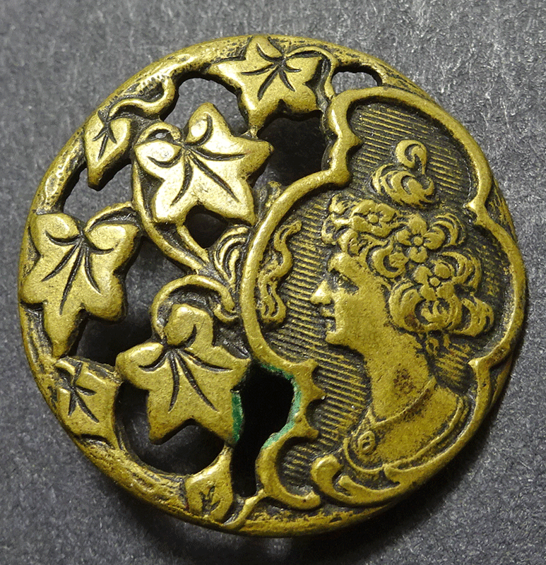 Female head and pierced ivy
