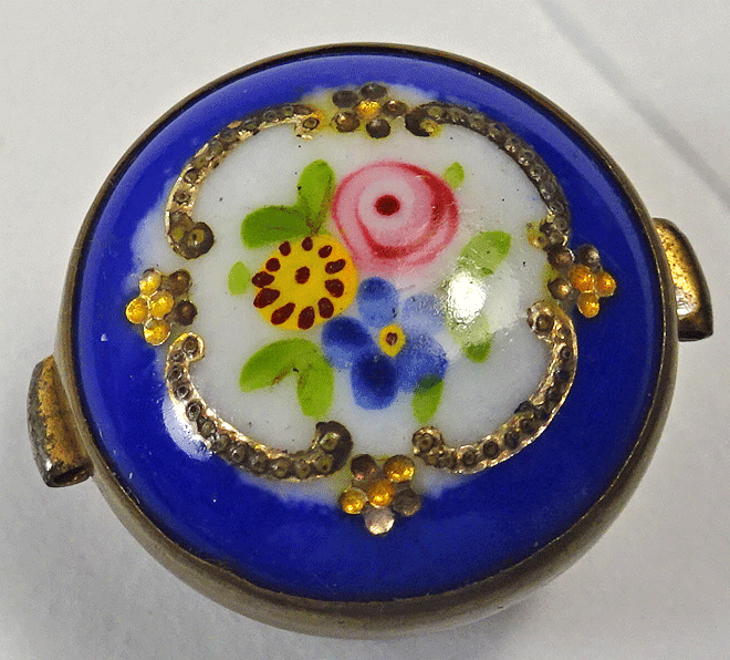Blue ceramic solitaire with flowers