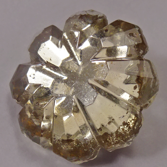 Glass flower, mirror back