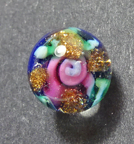 Tiny paperweight, pink rose on blue