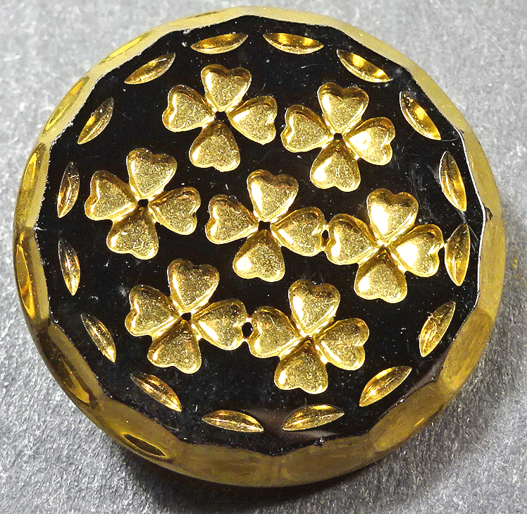Black glass, intaglio gold shamrocks