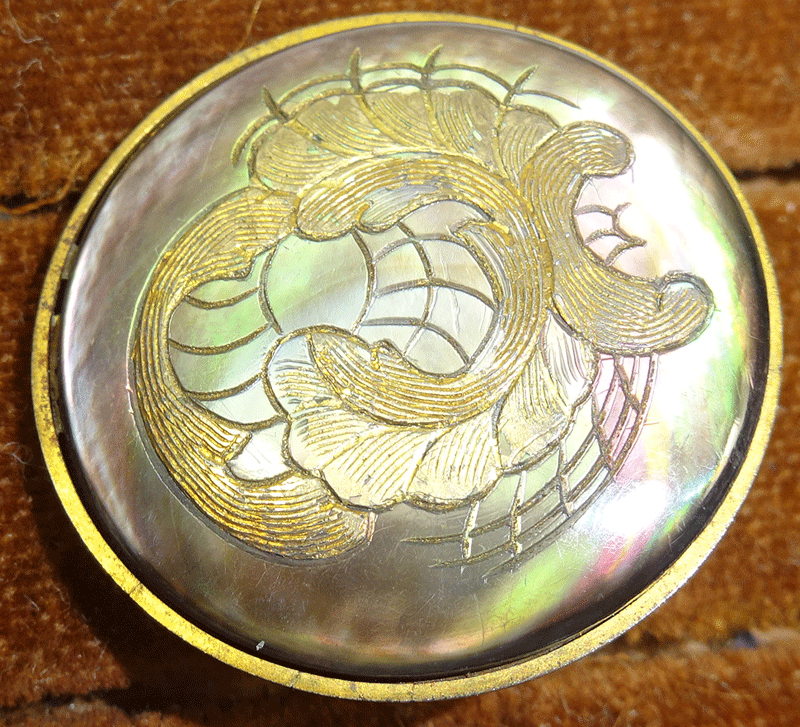 Smokey pearl, incised gold scrolls