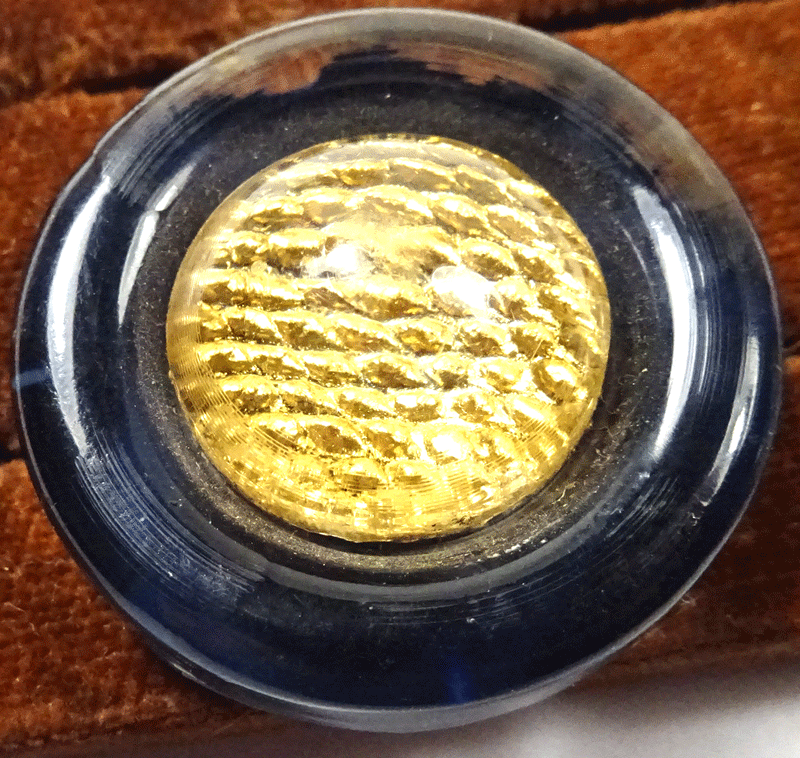 Large lucite with gold centre