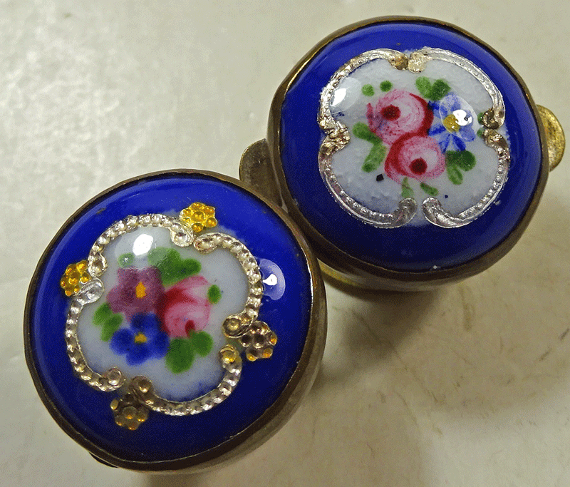 Pair of ceramic solitaires, E Moore Patent