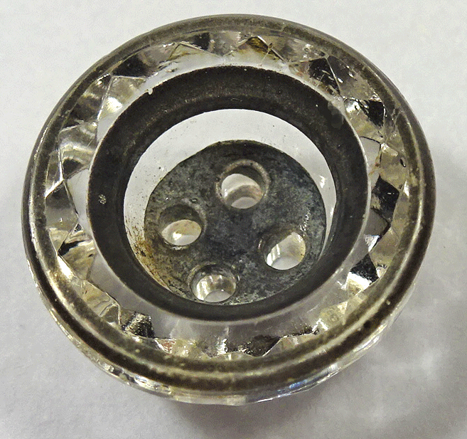 Small clear glass cup with black lines