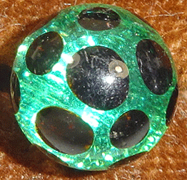 Black spotted green glass ball buttons