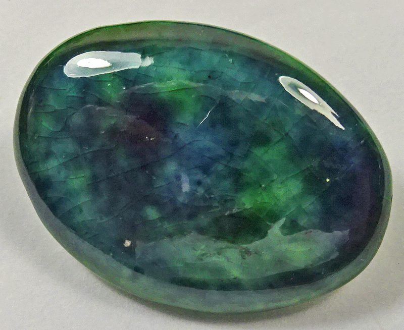 Dark green/blue glazed ceramic oval