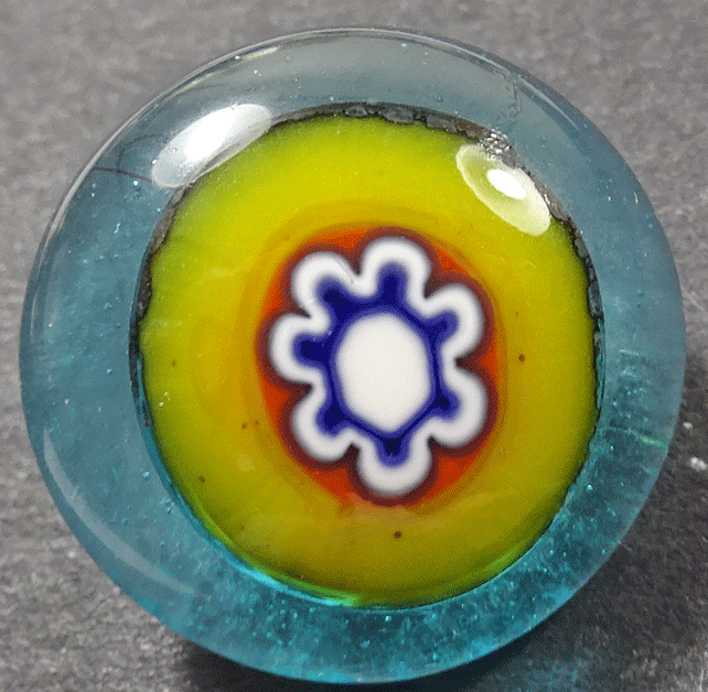 Turquoise glass inlaid with white flower in yellow