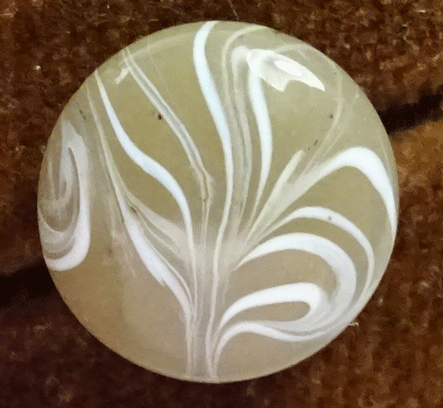 Small grey-brown glass with white swirls