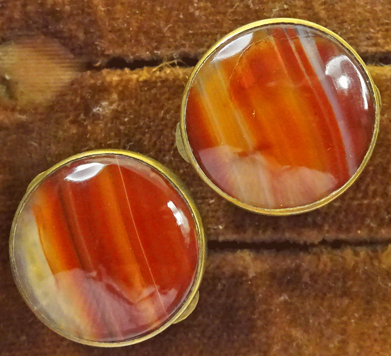 Pair of red agate solitaires, Wests Patent